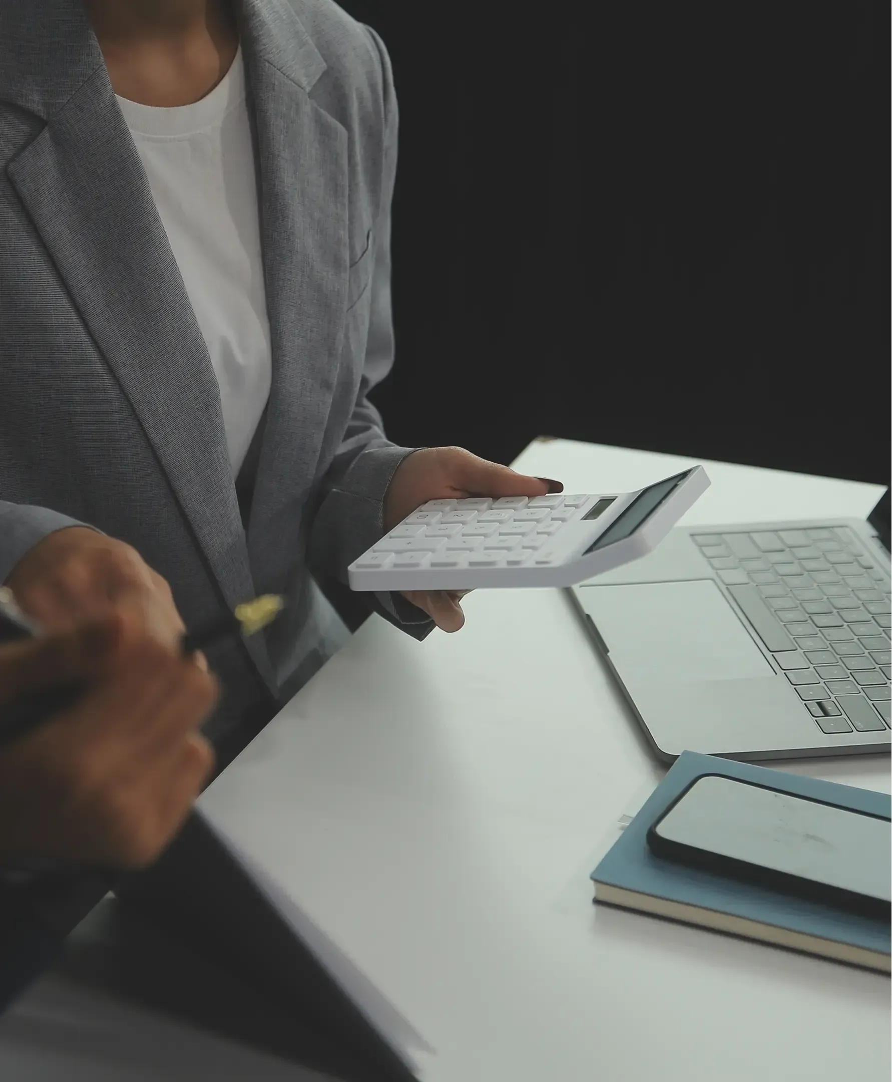 Woman holding calculator