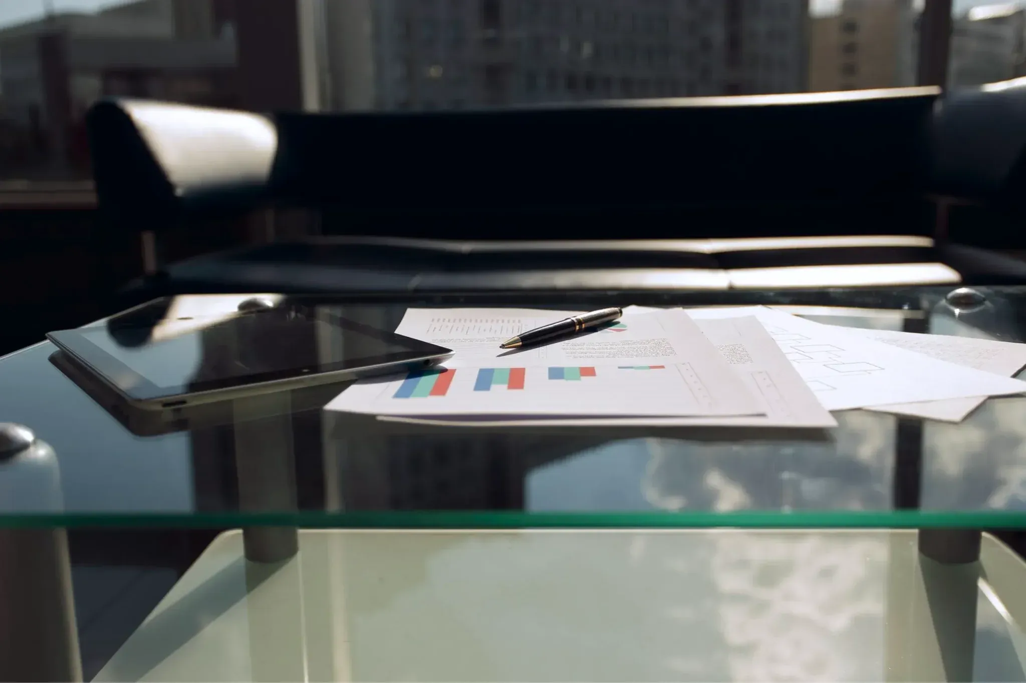 IPad and papers on a desk