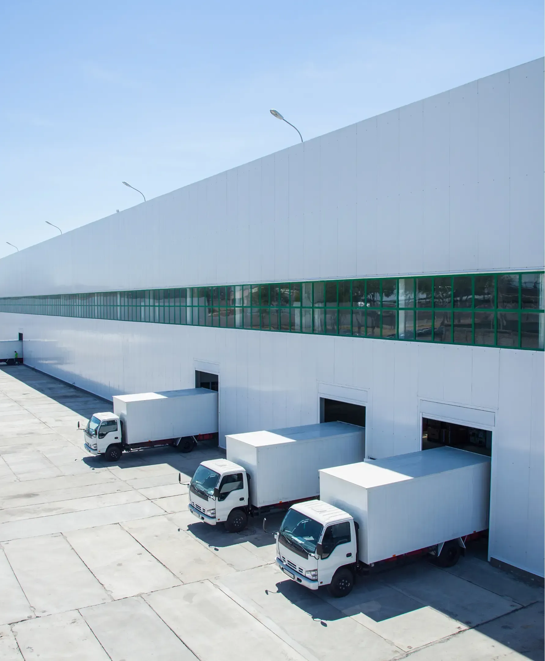 Trucks parked at a warehouse